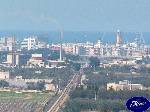 Triggiano: Il tratto ferroviario della Sud-Est con il ponte della tangenziale di Bari, il ponte di Via Omodeo in Bari, il campanile del palazzo della Provincia di Bari